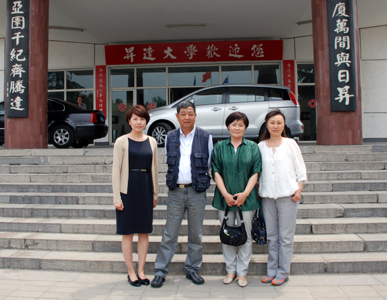 A Visit Paid by Liu Xianqin, Head of Henan Journalist Station of GuangMing Daily